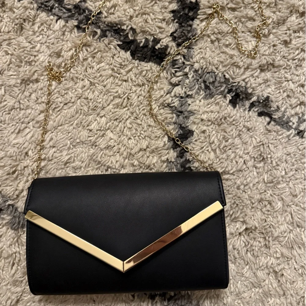 Black Clutch and Purse in One with Gold Accent - Picture 2 of 3